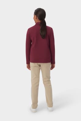 Back view of girl wearing a French  Toast burgundy long sleeve fitted interlock polo, showing back detail and fit. of  Long Sleeve Fitted Interlock Polo with Picot Collar (Feminine Fit)