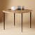 COUNTERPOINT ROUND TEAK TABLE view 1