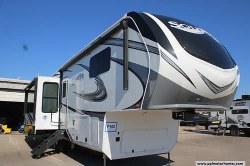 64589 - 34' 2021 Grand Design Solitude 310GK-R Image 1