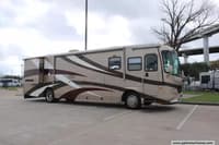 61810 - 38' 2004 Coachmen Cross Country SE 376DS 300hp Cummins w/2 Slides Image 1