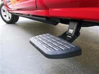 Amp Research BedStep2 Retractable Truck Step in Black Aluminum Image 1