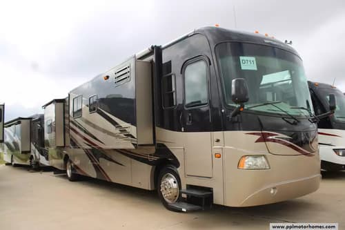 63866 - 40' 2011 Coachmen Cross Country 405FK 340hp Cummins w/4 Slides Image 1
