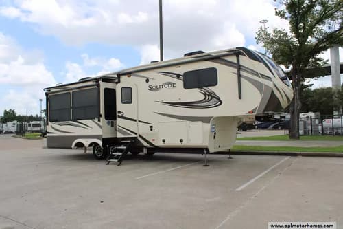 63810 - 34' 2019 Grand Design Solitude 310GK w/3 Slides Image 1
