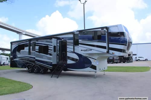 62950 - 45' 2024 Forest River Riverstone Legacy 42FSKG w/5 Slides - Toy Hauler Image 1