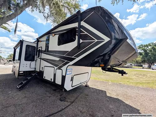 63235 - 43' 2020 Grand Design Momentum 397TH w/3 Slides & Generator  - Toy Hauler Image 1