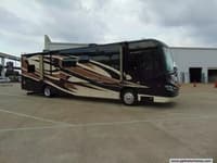 57268 - 41' 2015 Coachmen Cross Country Sportscoach 405FK 340hp Cummins w/4 Slides Image 1