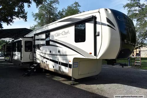 60772 - 39' 2017 Forest River Cedar Creek Champagne 38EL w/3 Slides & Generator Image 1