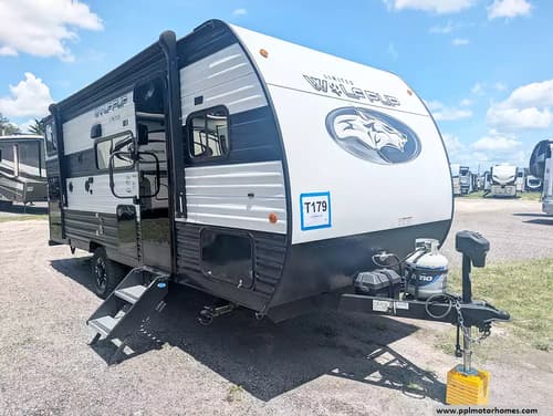 64415 - 22' 2024 Forest River Wolf Pup 17JW BLACK LABE w/Slide - Bunk House Image 1