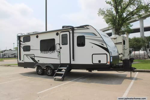 63034 - 25' 2023 Keystone Passport Sl Ultra Lite 219BH - Bunk House Image 1