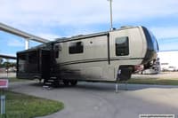 61680 - 39' 2025 Keystone Cougar Midnight Edition 360MBI w/4 Slides Image 1