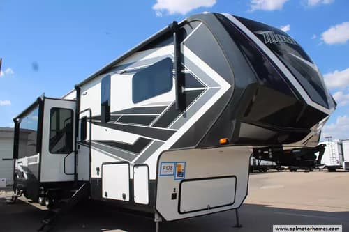 61056 - 43' 2021 Grand Design Momentum 397TH w/3 Slides & Generator  - Toy Hauler Image 1