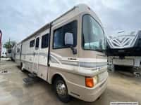 64010 - 35' 1999 Fleetwood Bounder 34V w/Slide Image 1