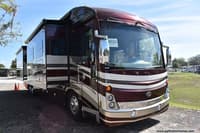 55462 - 44' 2015 American Coach Tradition 45T 500hp Cummins w/3 Slides Image 1