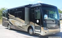 60056 - 33' 2015 Tiffin Breeze 32BR 240hp Maxxforce w/2 Slides Image 1