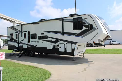 63604 - 38' 2021 Grand Design Momentum 353G w/2 Slides & Generator  - Toy Hauler Image 1