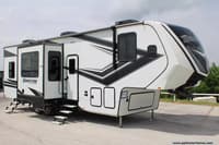 59100 - 36' 2022 Grand Design Momentum 320G w/2 Slides & Generator Image 1