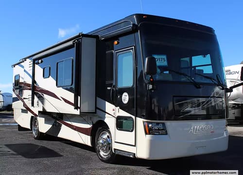 61562 - 34' 2011 Tiffin Allegro Red 34QFA 340hp Cummins w/4 Slides Image 1