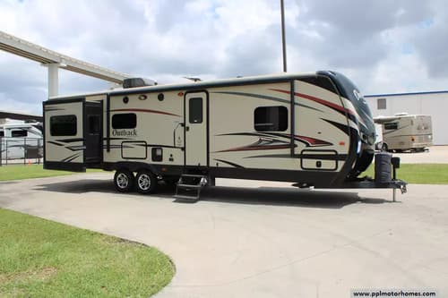 63293 - 35' 2015 Keystone Outback Super Lite 298RE w/3 Slides Image 1