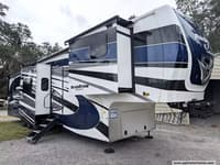 64973 - 45' 2022 Forest River Riverstone Legacy 42FSKG w/5 Slides & Generator  - Toy Hauler Image 1