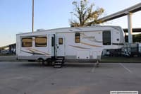 61247 - 38' 2021 Palomino Columbus Compass 329DVC w/3 Slides Image 1