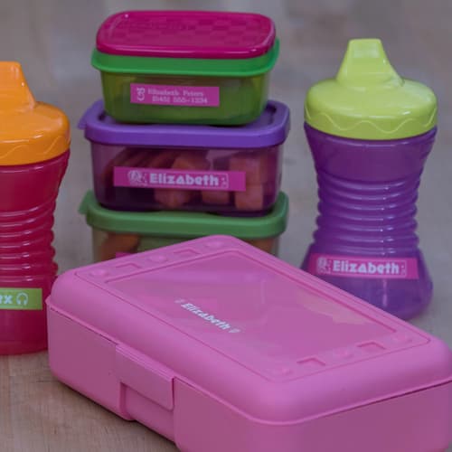 Brother PTH110 label maker with pink TZEMQG35 tape bundle