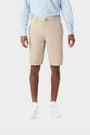 Young man wearing khaki French Toast flat front stretch twill short, front shot showing above the knee length and waistband. of  Boys' Flat Front Stretch Twill Short opens large image - 5 of 5