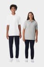 Adult man and woman wearing French Toast polo shirts in white and heather grey, front view showing fit of adult size range. of  Short Sleeve Pique Polo - 5 of 5