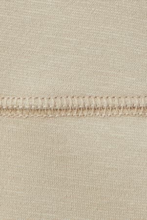 detail view of flat seams of  Adaptive Pleated Ponte Skort