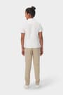 Back shot of girl wearing white French Toast girls&#39; short sleeve fitted oxford shirt, back detail, seams, and length. of  Short Sleeve Fitted Oxford Shirt (Feminine Fit) opens large image - 4 of 5