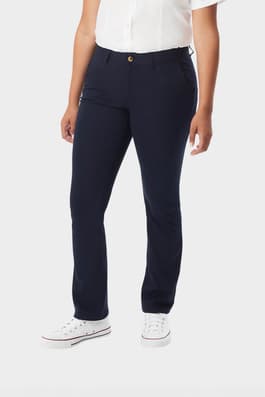 Front view of young woman wearing navy French Toast straight fit stretch twill pant, showing button waistband and straight leg. of  Girls' Straight Fit Stretch Twill Pant