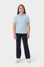 Girl wearing blue French Toast short sleeve fitted stretch pique polo front view showing feminine fit and collar. of  Short Sleeve Fitted Stretch Pique Polo (Feminine Fit) opens large image - 3 of 5
