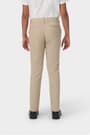 Back view of girl in khaki French Toast slim fit stretch twill pant, showing waistband and stretch twill fabric. of  Girls' Slim Fit Stretch Twill Pant opens large image - 4 of 5