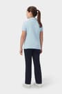 Back view of girl wearing blue  French Toast short sleeve fitted stretch pique polo, highlighting feminine fit. of  Short Sleeve Fitted Stretch Pique Polo (Feminine Fit) opens large image - 4 of 5