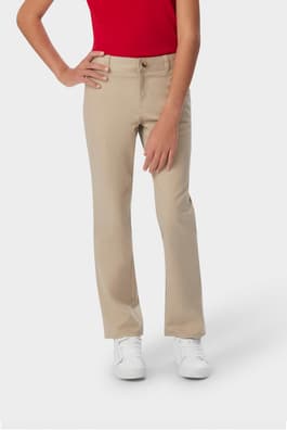 Front view of girl wearing khaki French Toast girls&#39; straight fit stretch twill pant, showing waistband and straight leg fit. of  Girls' Straight Fit Stretch Twill Pant