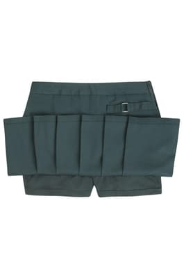 Front view of girl in khaki French Toast pleated two-tab skort, showing front knit pleats and classic tab detail styling.