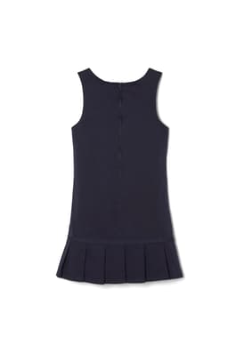 Back view of pleated twill jumper with ribbon bow