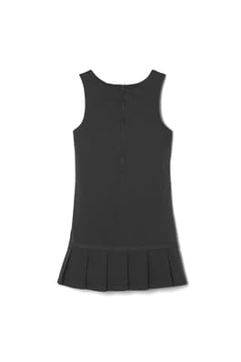 Back view of pleated twill jumper with ribbon bow