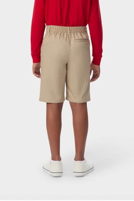 Back shot of boy wearing khaki French Toast boys&#39; pull-on twill short, showcasing elastic back waist and classic styling. of  Boys' Pull-On Twill Short