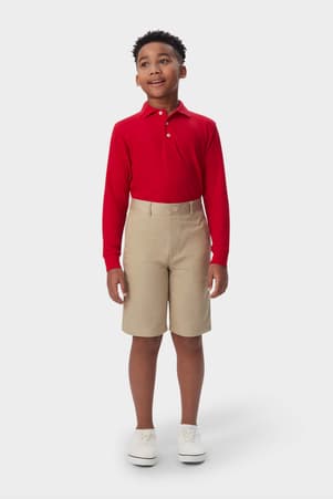 Front shot of boy wearing khaki French Toast boys&#39; pull-on twill short, showing above the knee length and comfortable fit. of  Boys' Pull-On Twill Short