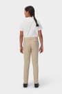 Girl in khaki French Toast girls&#39; slim fit stretch twill pant, front view showing slim leg and on seam pockets.  of  Girls' Slim Fit Stretch Twill Pant opens large image - 3 of 5