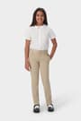 Back view of girl in khaki French Toast slim fit stretch twill pant, showing waistband and stretch twill fabric. of  Girls' Slim Fit Stretch Twill Pant opens large image - 4 of 5