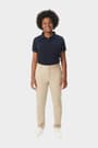 Young woman in khaki French Toast slim fit stretch twill pant, front view showing slim leg and waistband with belt loops. of  Girls' Slim Fit Stretch Twill Pant opens large image - 5 of 5