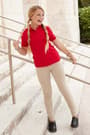 Girl in short sleeve polo shirt of  Short Sleeve Fitted Interlock Polo with Picot Collar (Feminine Fit) opens large image - 4 of 4
