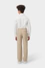 Back view of boy wearing khaki French Toast boys&#39; relaxed fit twill pant, showing back pocket and classic styling. of  Boys' Relaxed Fit Twill Pant opens large image - 4 of 5