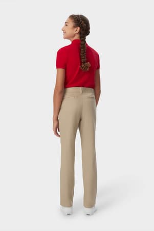 Girl wearing khaki French Toast straight fit stretch twill pant, back view showcasing belt loops and slash pockets.  of  Girls' Straight Fit Stretch Twill Pant