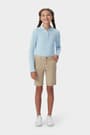 Front view of girl wearing khaki French Toast girls&#39; twill Bermuda short, showing Bermuda length and side pockets. of  Girls' Stretch Twill Bermuda Short opens large image - 3 of 5