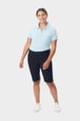 Front view of woman wearing navy French Toast twill Bermuda short, showing Bermuda length and button waistband. of  Girls' Stretch Twill Bermuda Short opens large image - 5 of 5