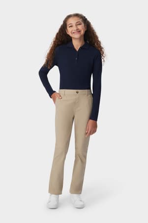 Front view of girl wearing khaki girls&#39; pull-on straight fit stretch twill pant, showing waistband and side pockets. of  Girls' Pull-On Straight Fit Stretch Twill Pant