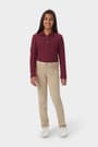Girl wearing khaki French Toast girls&#39; slim fit stretch Ponte pant, front view showing belt loops and slim leg. of  Girls' Slim Fit Stretch Ponte Pant opens large image - 3 of 4