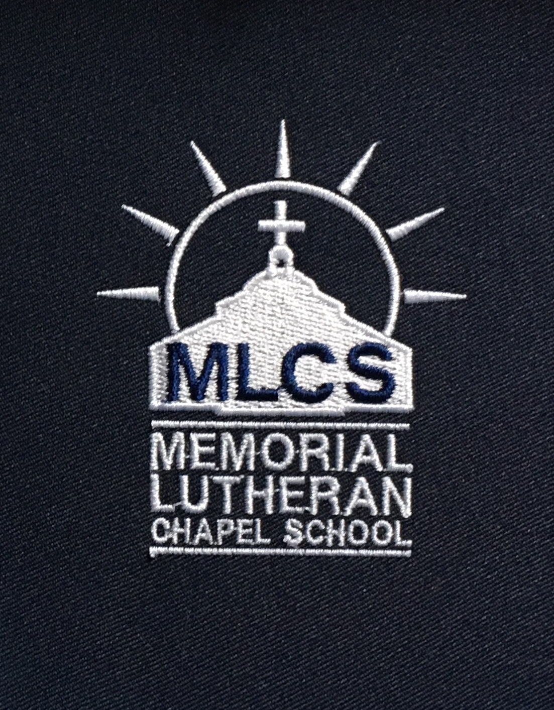 Memorial Lutheran Chapel School logo